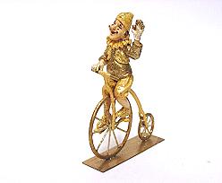 clown bike, gold