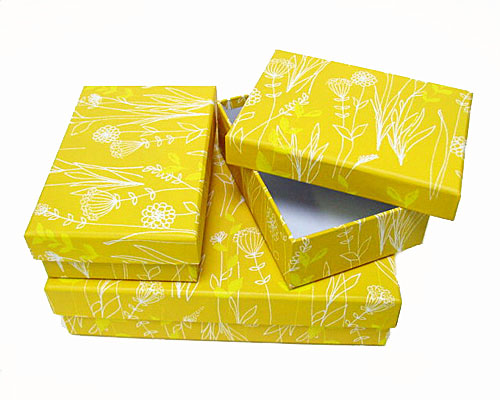 Paperboxes rectangular / set of 3 / one large/ two smaller/ ocreyellow flowers